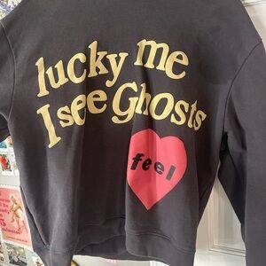 Black hoodie with lettering and designs